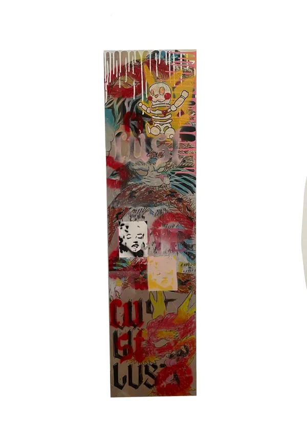 A tall narrow panel of bare metal covered in drawing and spray paint: blackletter type running down the left side, a red and yellow bird in oil pastel, and a row of collaged faces along the top.